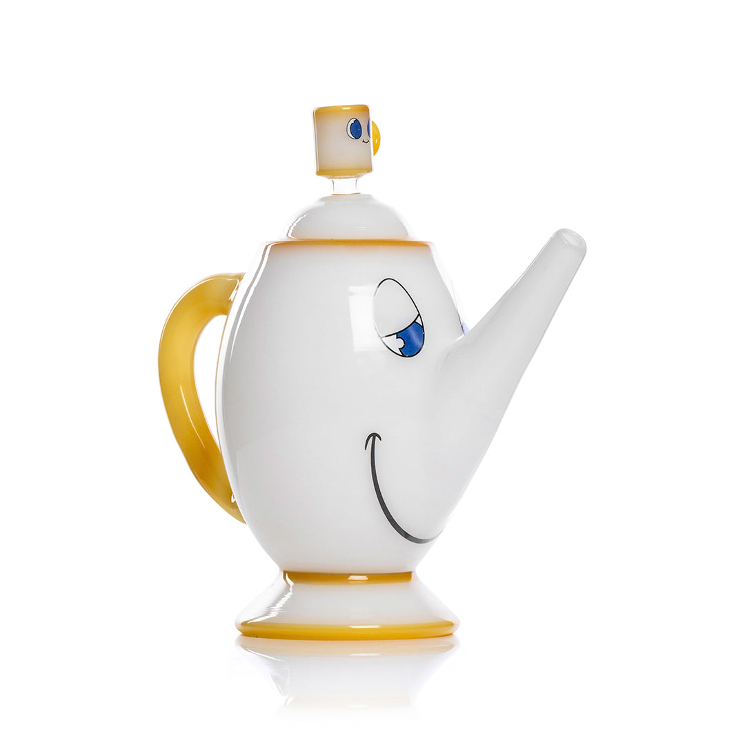 Front view of the Tea Pot XL Bong, a white ceramic piece with a curved spout and handle, reflecting light on a clean surface. Front view of the Tea Pot XL Bong, a white ceramic piece with a curved spout and handle, reflecting light on a clean surface.