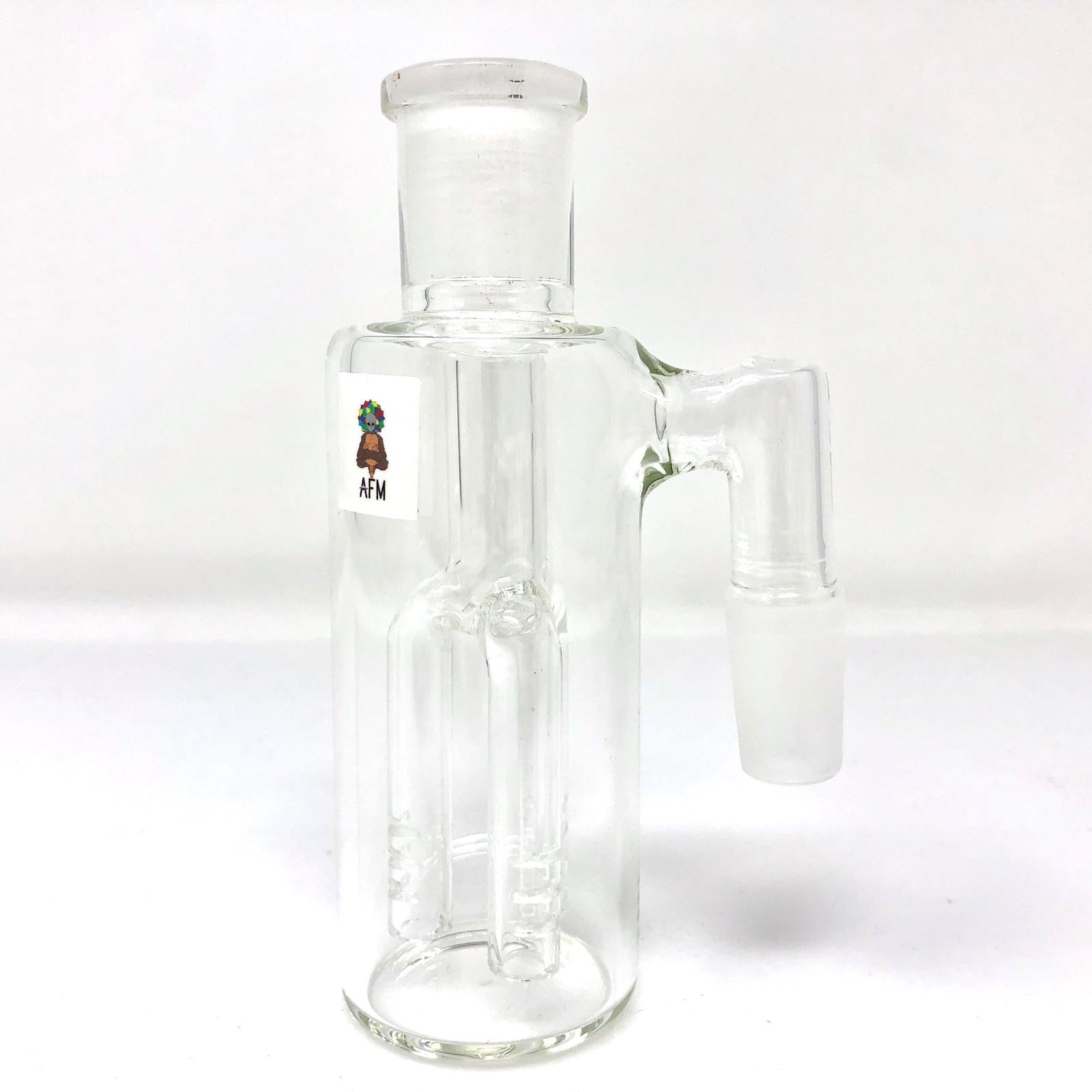 Clear Glass Ashcatcher displayed in a studio shot, showing the clear glass construction and simple, cylindrical design. Clear Glass Ashcatcher displayed in a studio shot, showing the clear glass construction and simple, cylindrical design.