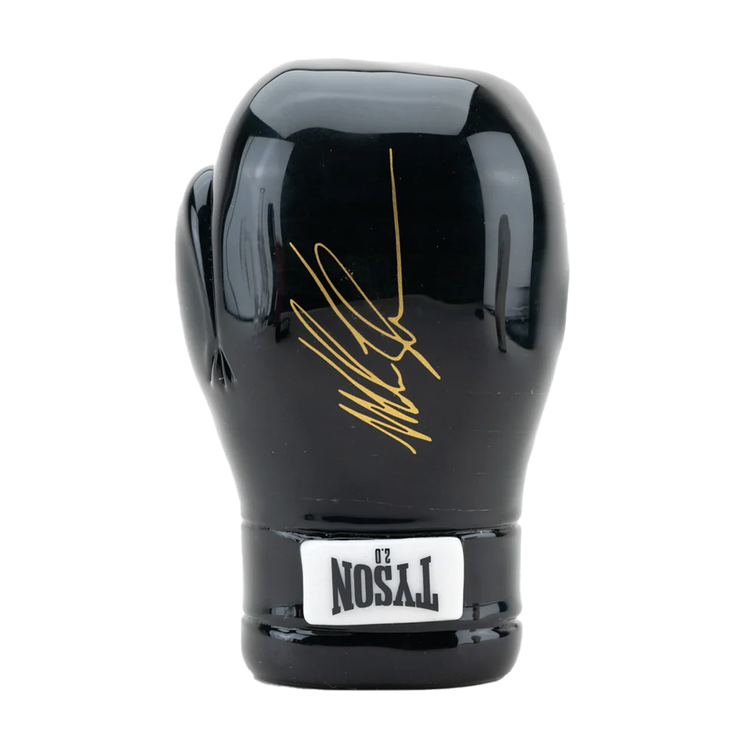 A front view of the Boxing Glove Hand Pipe, shaped like a black boxing glove with detailed stitching. A front view of the Boxing Glove Hand Pipe, shaped like a black boxing glove with detailed stitching.