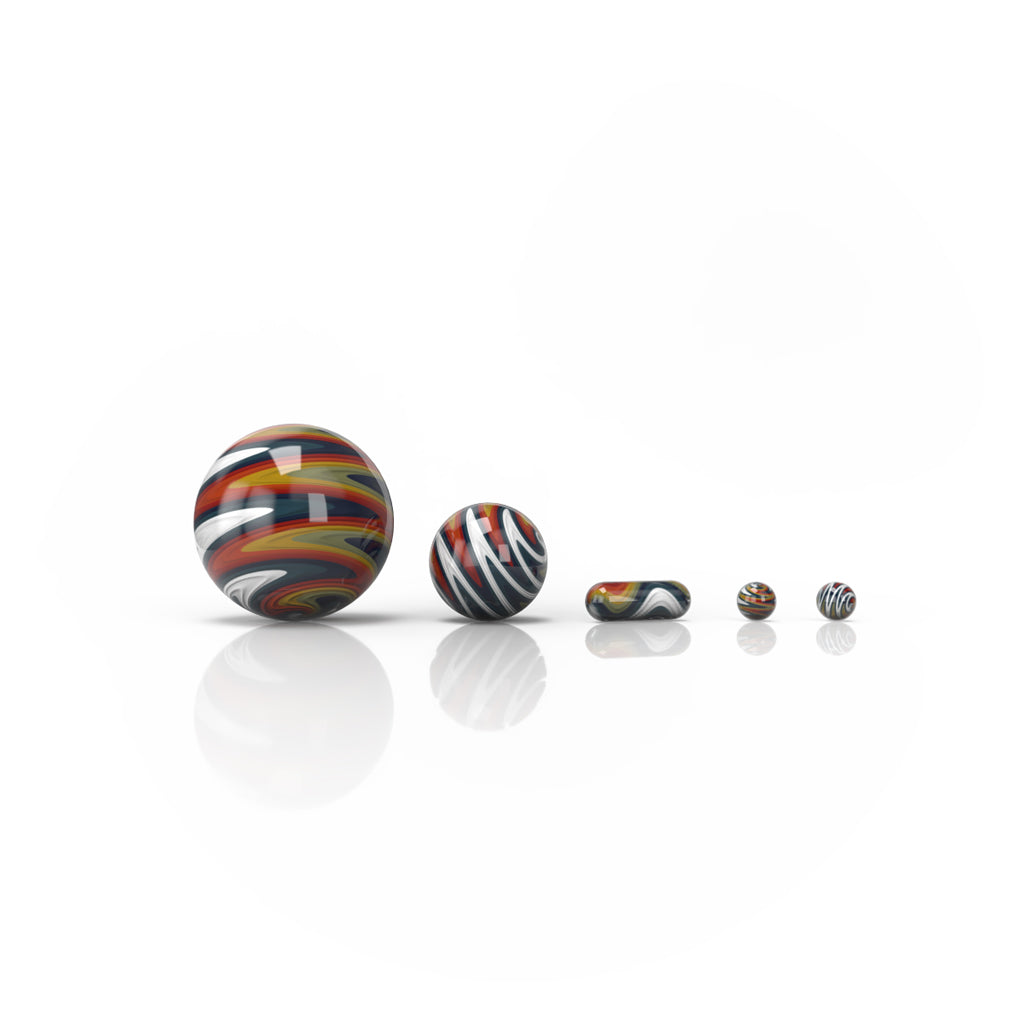 A studio shot displays the five colorful marbles from the Wig Wag 5-Piece Dab Marble Set, arranged in a neat row on a reflective surface. A studio shot displays the five colorful marbles from the Wig Wag 5-Piece Dab Marble Set, arranged in a neat row on a reflective surface.