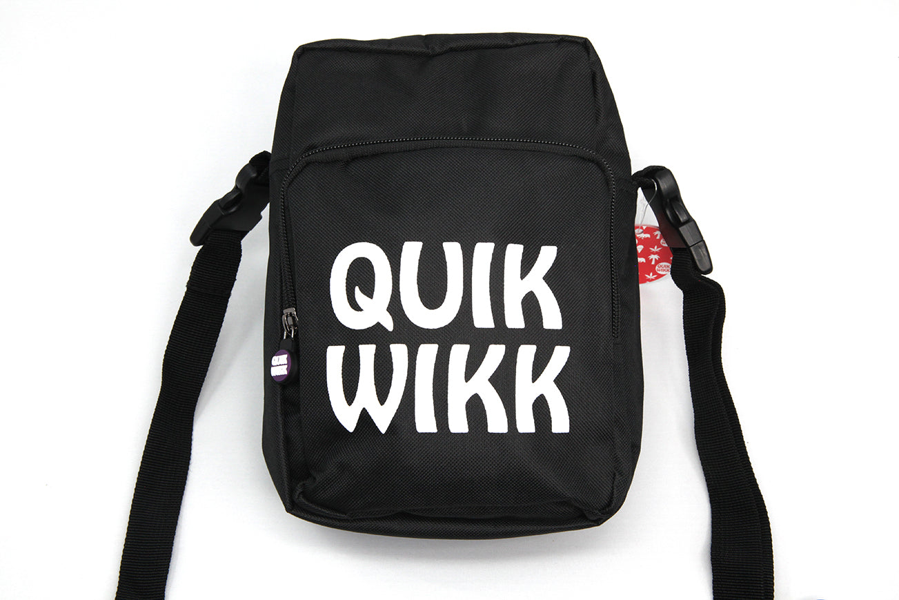 Front view of the Quik Shoulder Cross Body Bag, a black nylon bag with a strap, angled slightly against a plain white background. Front view of the Quik Shoulder Cross Body Bag, a black nylon bag with a strap, angled slightly against a plain white background.
