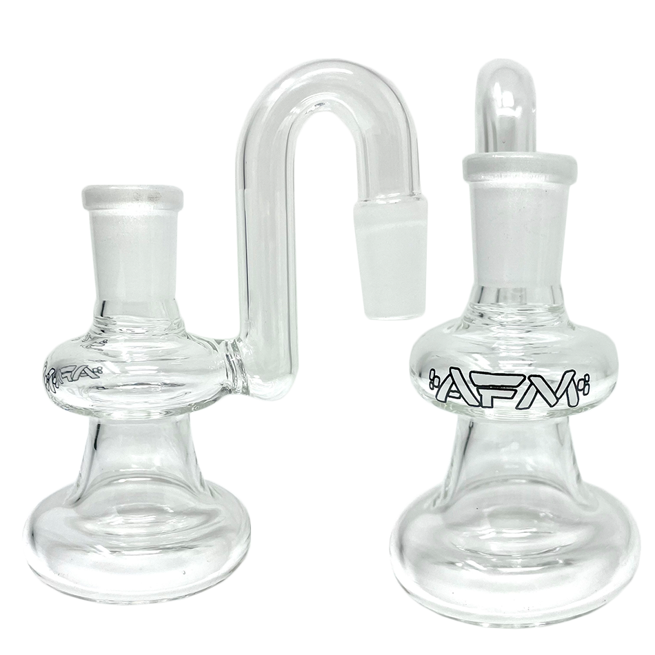 Clear Dry Ashcatcher displayed in a close-up, angled view, showcasing its transparent glass construction and curved design. Clear Dry Ashcatcher displayed in a close-up, angled view, showcasing its transparent glass construction and curved design.