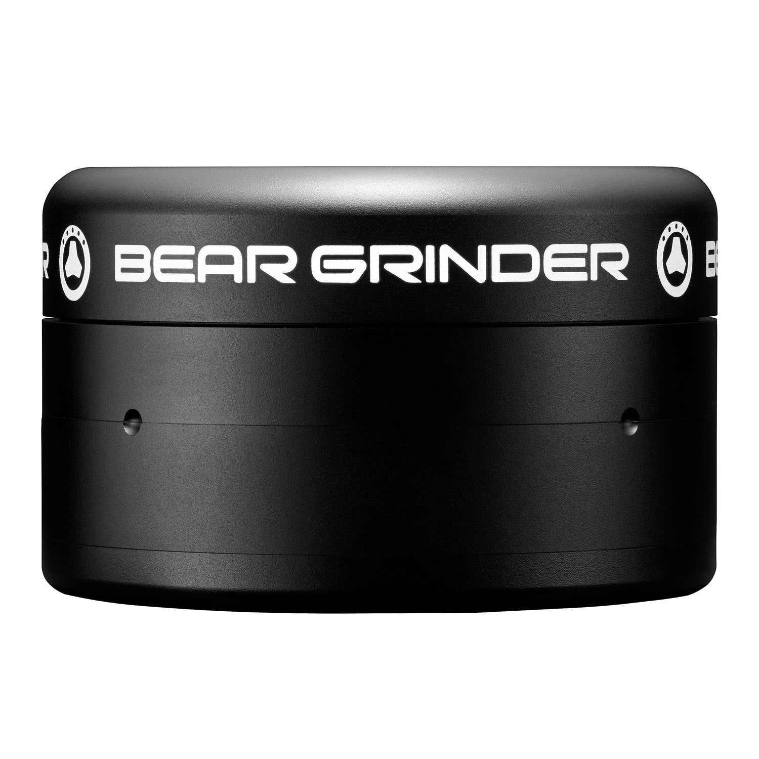 Front view of the 4-Piece Grinder, a dark metal grinder with a simple, cylindrical design against a plain background. Front view of the 4-Piece Grinder, a dark metal grinder with a simple, cylindrical design against a plain background.