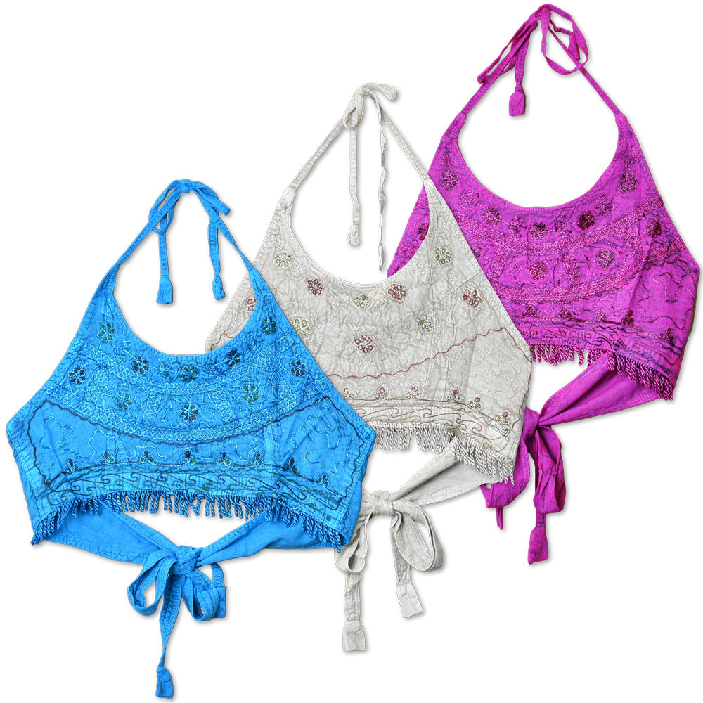 Front view of the Embroidered String Halter Top, a purple and blue top with delicate embroidery and string tie closures, displayed against a white background. Front view of the Embroidered String Halter Top, a purple and blue top with delicate embroidery and string tie closures, displayed against a white background.