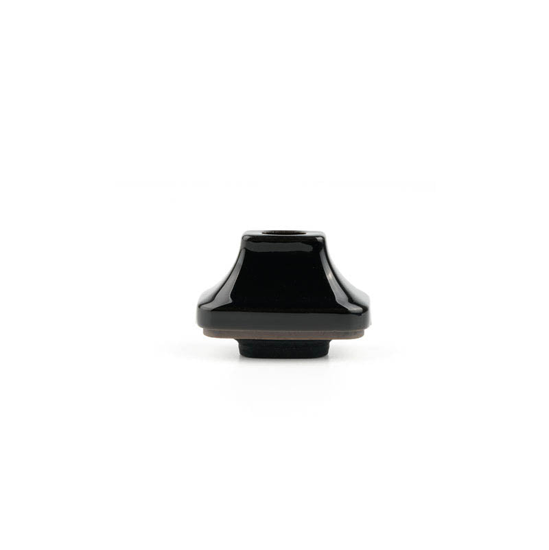 Front view of the Avant Ceramic Mouthpiece, a smooth, dark ceramic piece presented on a plain white background. Front view of the Avant Ceramic Mouthpiece, a smooth, dark ceramic piece presented on a plain white background.