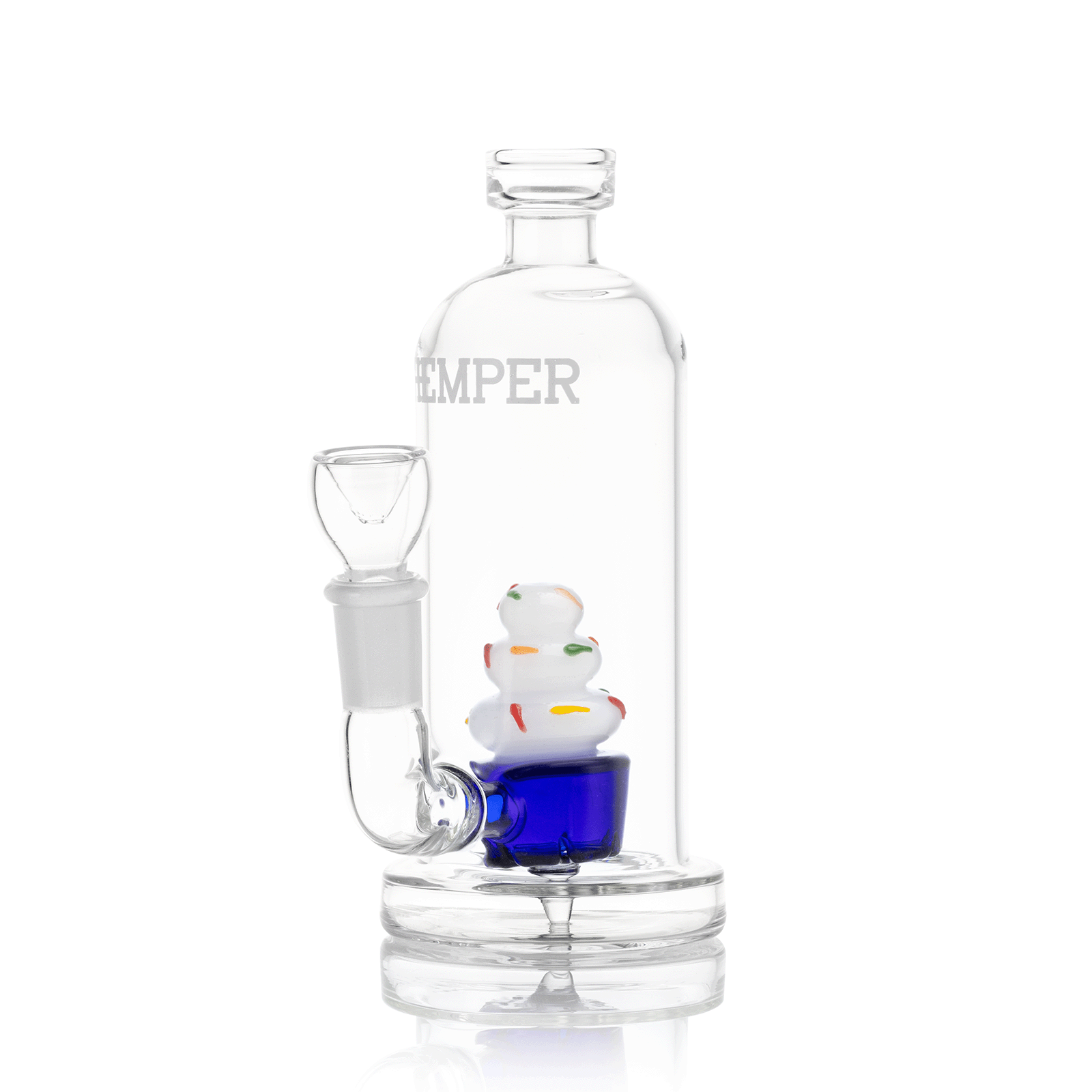 The Cupcake Bong is displayed in a clean, angled studio shot, showcasing its whimsical, frosted design. The Cupcake Bong is displayed in a clean, angled studio shot, showcasing its whimsical, frosted design.