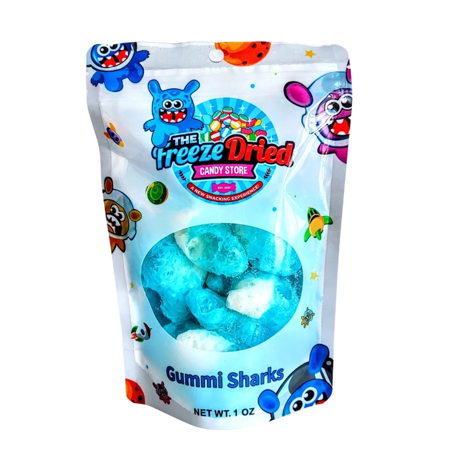 Front view of The Freeze Dried Candy Store Freeze Dried Gummi Sharks, showcasing their bright blue, puffed texture against a dark background. Front view of The Freeze Dried Candy Store Freeze Dried Gummi Sharks, showcasing their bright blue, puffed texture against a dark background.