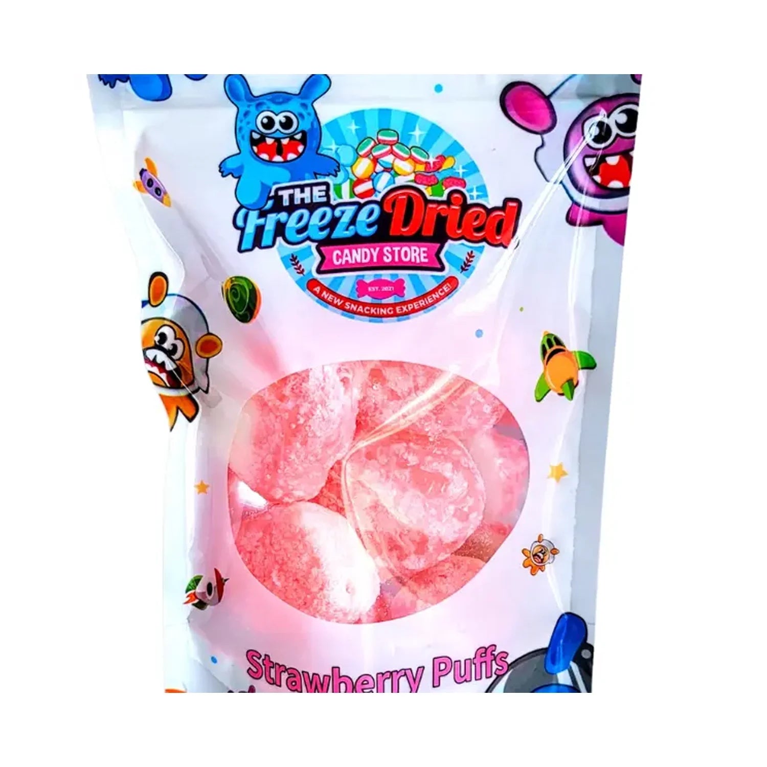 A close-up of The Freeze Dried Candy Store Freeze Dried Strawberry Puffs in a clear package with colorful branding. A close-up of The Freeze Dried Candy Store Freeze Dried Strawberry Puffs in a clear package with colorful branding.