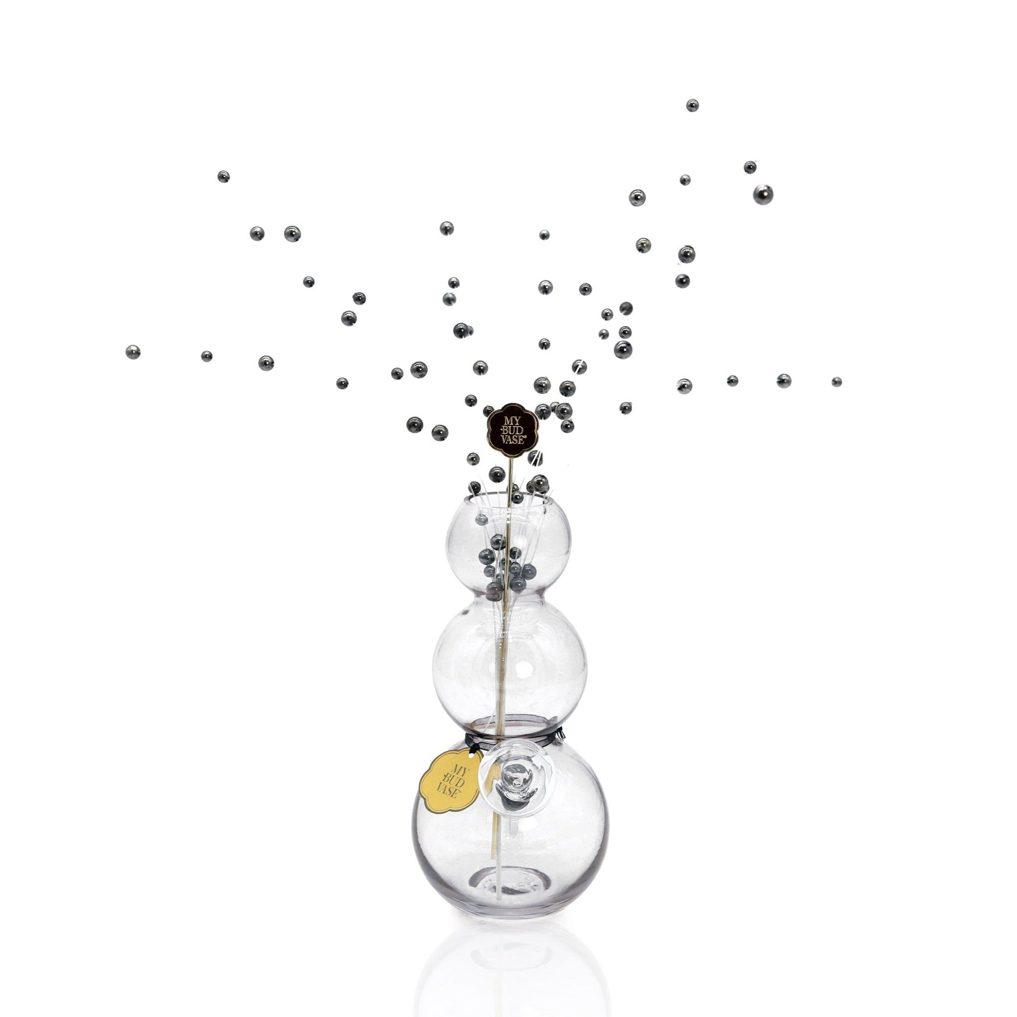 Front view of the Bubbles Vase Bong, a clear glass piece with a rounded base and narrow neck. Front view of the Bubbles Vase Bong, a clear glass piece with a rounded base and narrow neck.