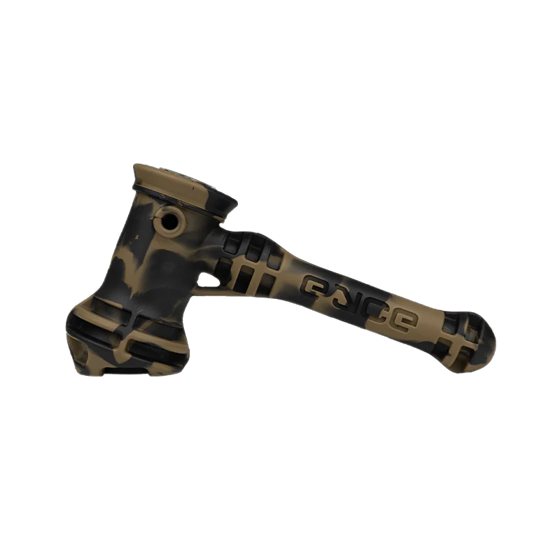 A studio shot of the Silicone Hammer Style Bubbler, showing the uniquely shaped, dark gray silicone bubbler against a plain white background. A studio shot of the Silicone Hammer Style Bubbler, showing the uniquely shaped, dark gray silicone bubbler against a plain white background.