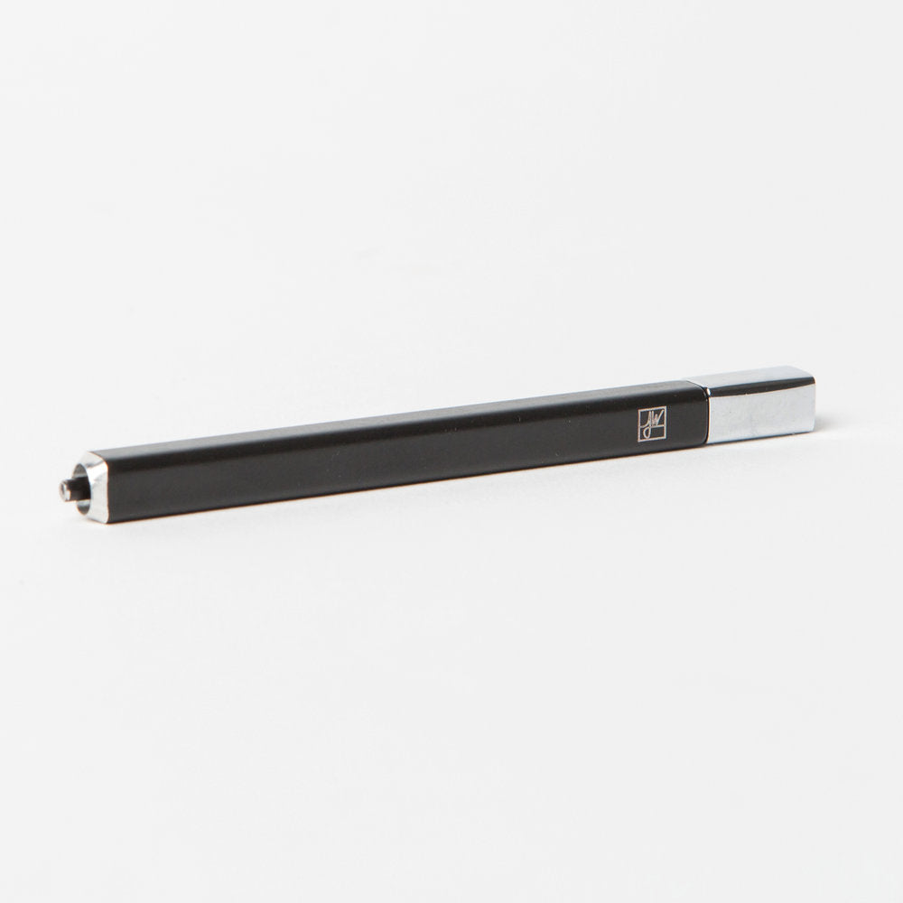 A side view of The Solo - One Hitter, showing its sleek, cylindrical shape against a neutral background. A side view of The Solo - One Hitter, showing its sleek, cylindrical shape against a neutral background.