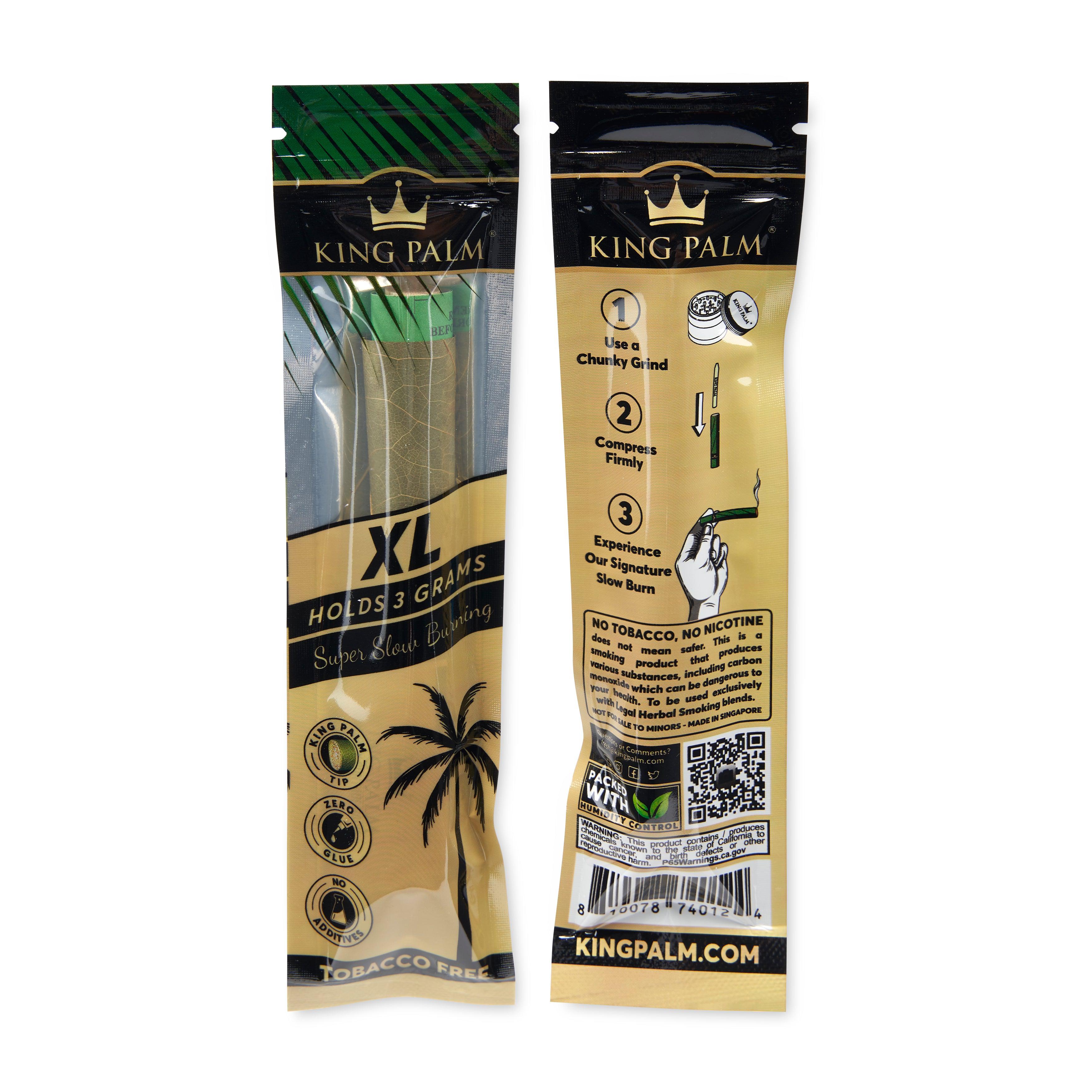 A close-up of the King XL Natural Pre Roll Single Palm Leaf Tubes packaging, showcasing the branding and text details on a colorful background. A close-up of the King XL Natural Pre Roll Single Palm Leaf Tubes packaging, showcasing the branding and text details on a colorful background.
