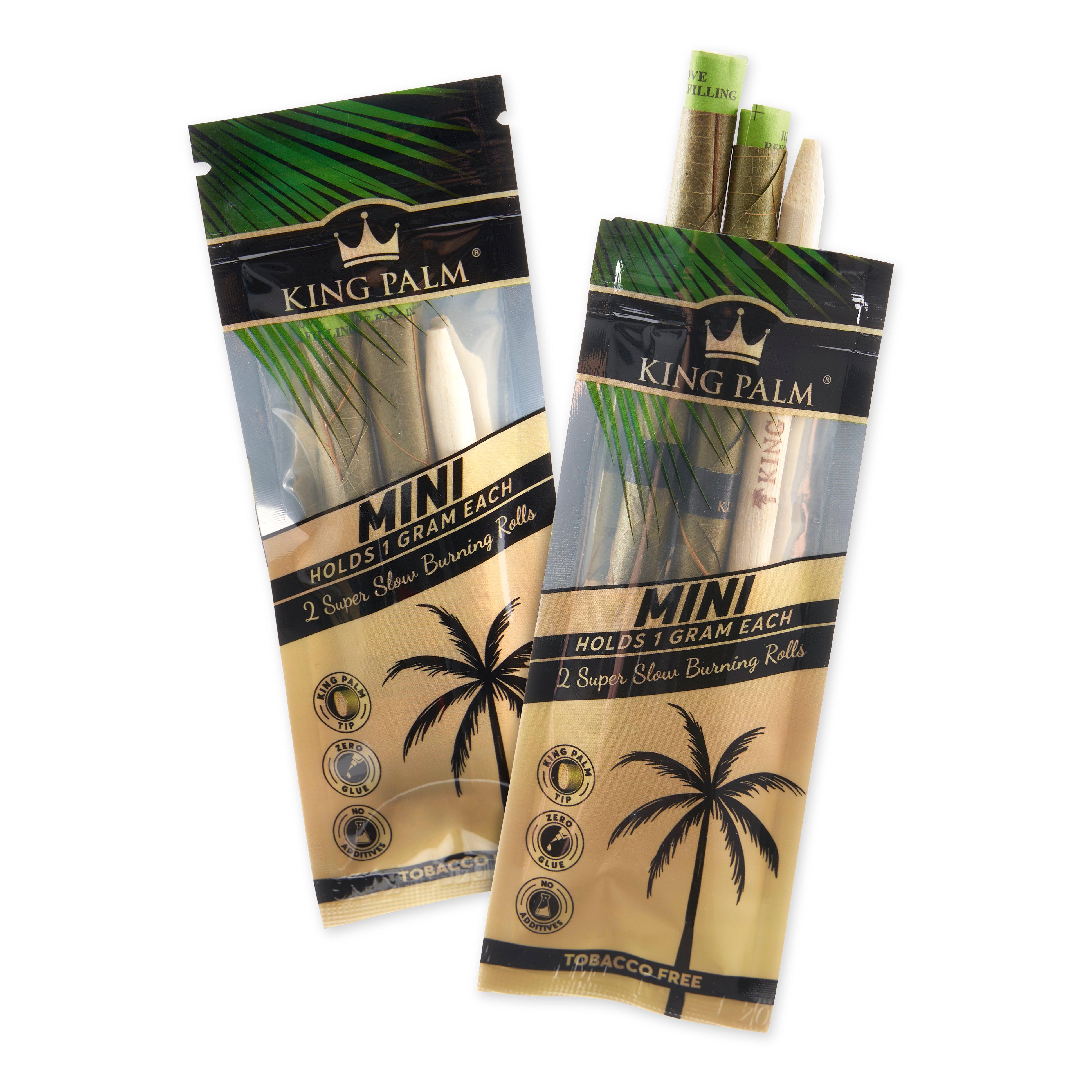 A close-up of two packs of Mini Natural Pre Roll Palm Leaf Tubes, displaying branding and a natural, textured appearance. A close-up of two packs of Mini Natural Pre Roll Palm Leaf Tubes, displaying branding and a natural, textured appearance.