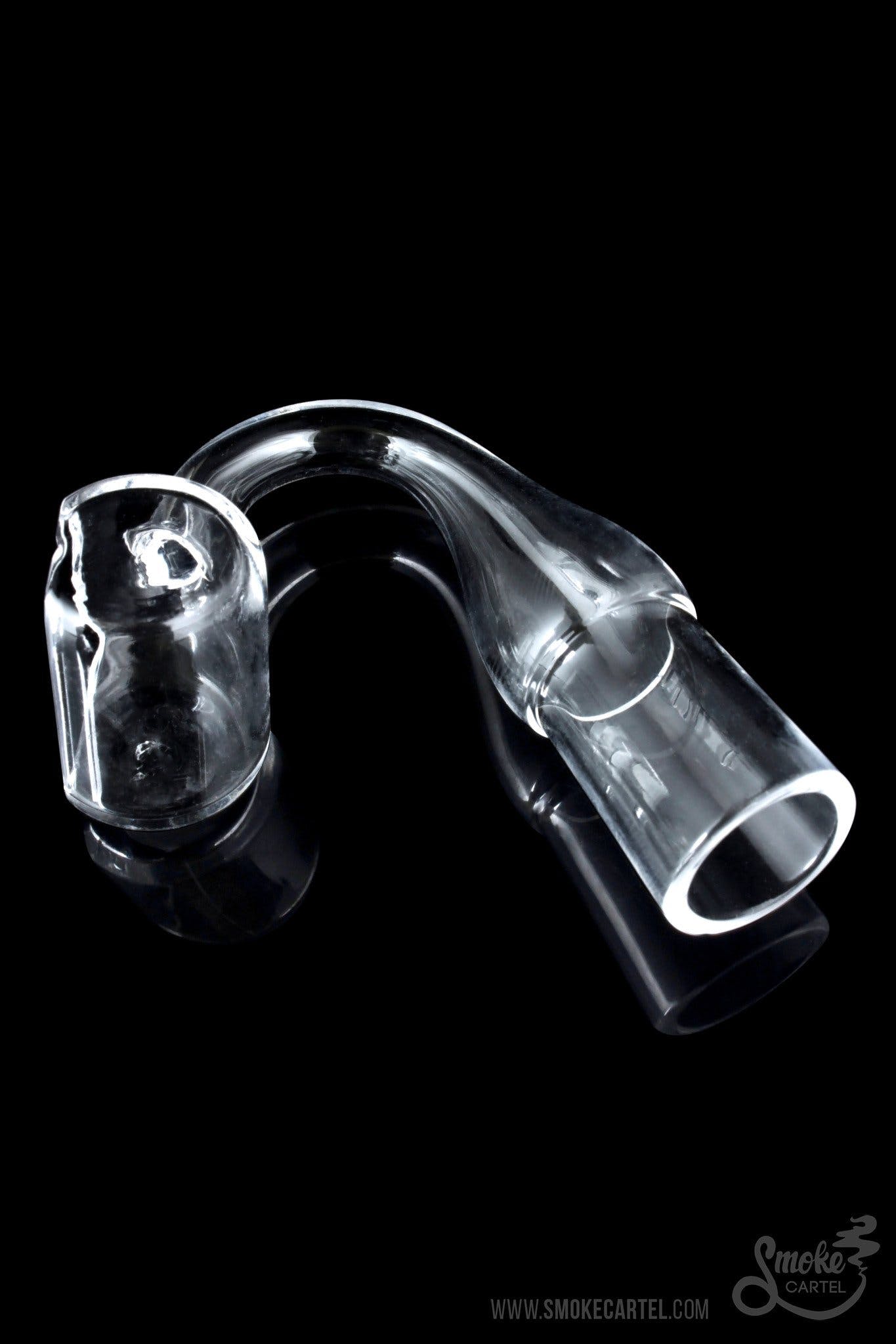 A close-up, angled view of the Dozer Quartz Banger, showcasing its clear glass construction and rounded shape. A close-up, angled view of the Dozer Quartz Banger, showcasing its clear glass construction and rounded shape.