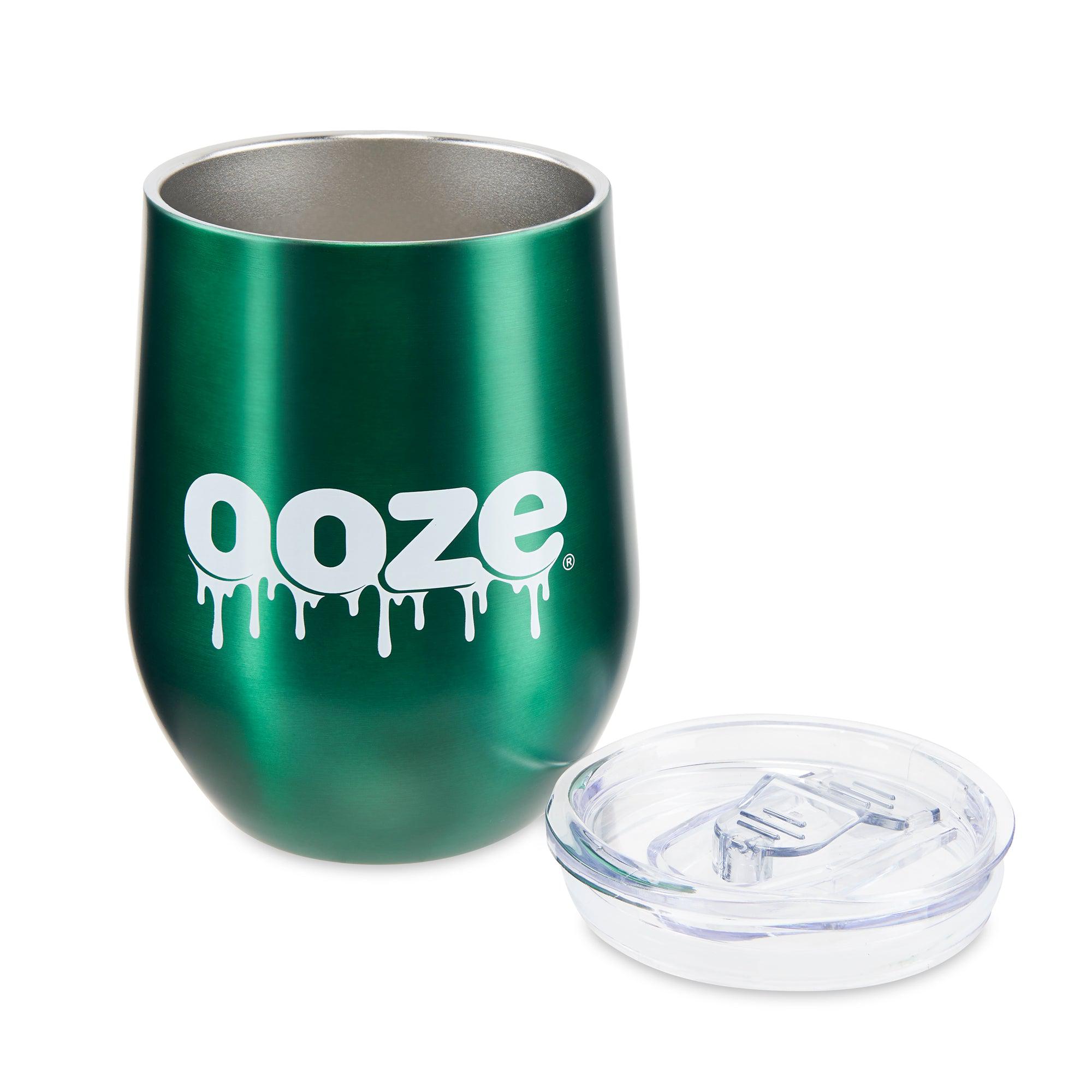 A close-up, angled view of the Ooze Tumbler, showing its smooth, dark exterior and lid detail. A close-up, angled view of the Ooze Tumbler, showing its smooth, dark exterior and lid detail.
