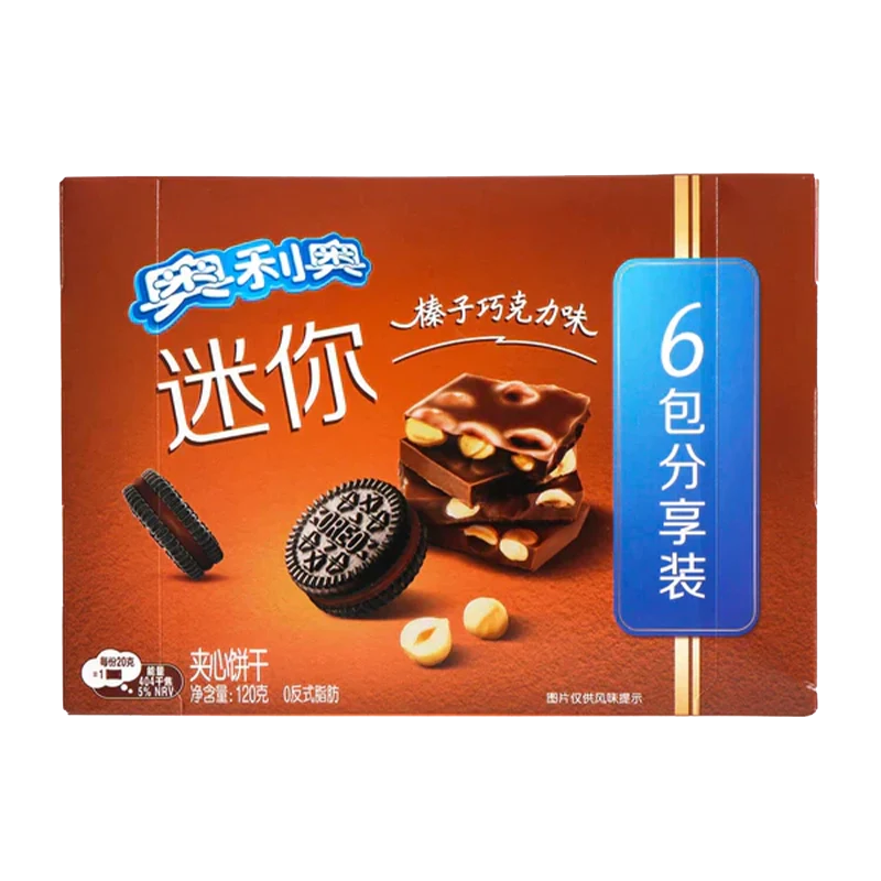 A close-up, angled shot of Oreo Mini Cookies - Hazelnut Chocolate in a vibrant red box, with Chinese characters displayed on the packaging. A close-up, angled shot of Oreo Mini Cookies - Hazelnut Chocolate in a vibrant red box, with Chinese characters displayed on the packaging.