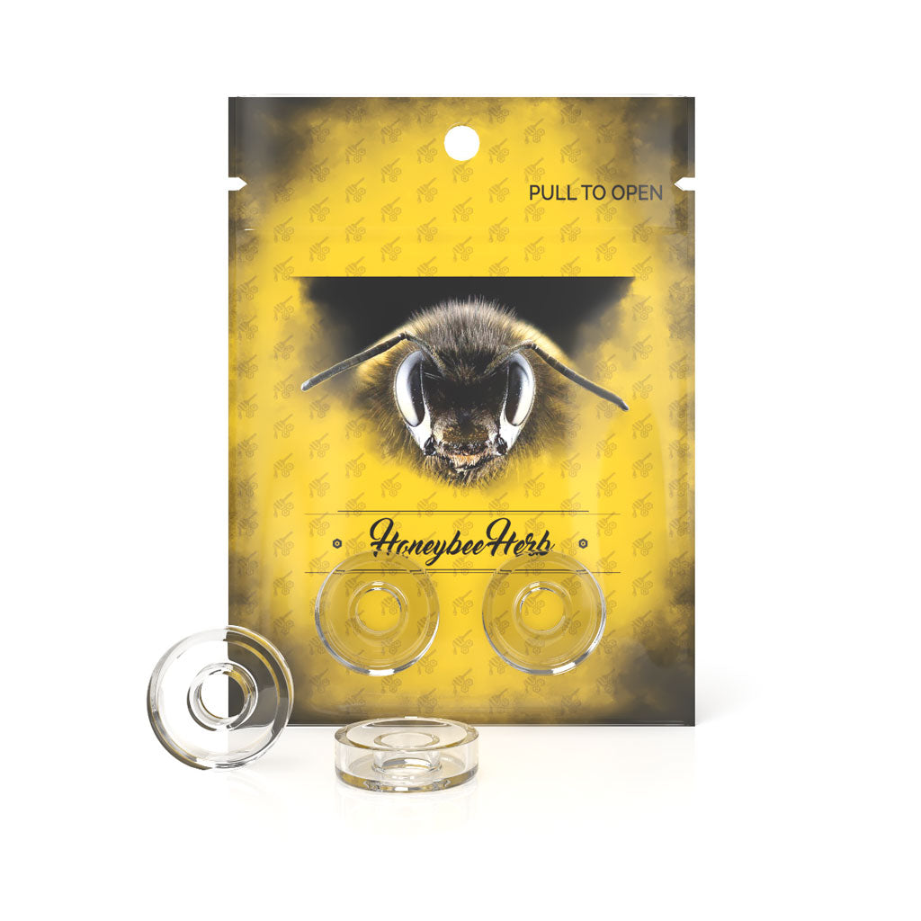 Front view of the Quartz Dishes For Hybrid displayed in clear packaging, showing the rounded, dish-like forms inside. Front view of the Quartz Dishes For Hybrid displayed in clear packaging, showing the rounded, dish-like forms inside.