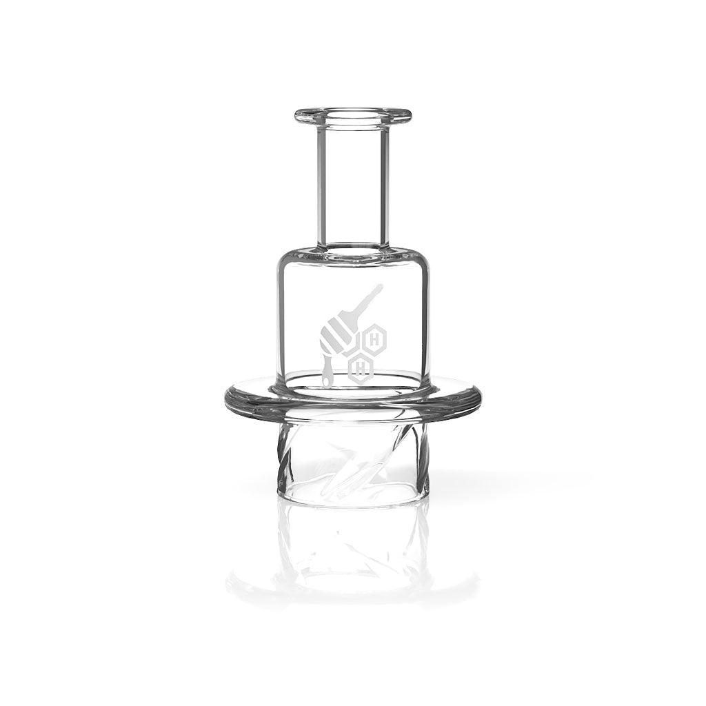The Quartz Honey Hive Carb Cap is pictured from above, showcasing its rounded, transparent design. The Quartz Honey Hive Carb Cap is pictured from above, showcasing its rounded, transparent design.
