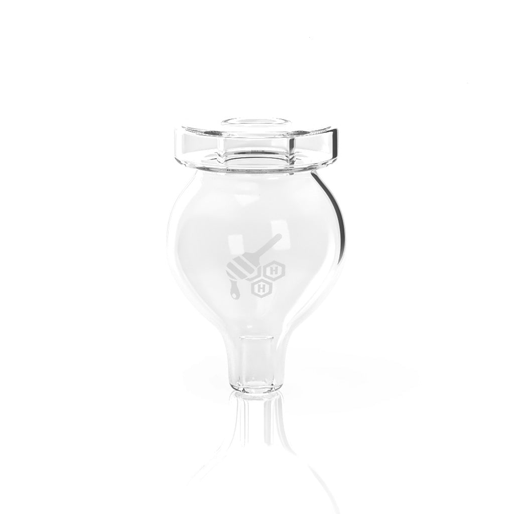 A clear, angled view of the Quartz Stub Bubble Carb Cap, showcasing its rounded shape and smooth glass construction. A clear, angled view of the Quartz Stub Bubble Carb Cap, showcasing its rounded shape and smooth glass construction.