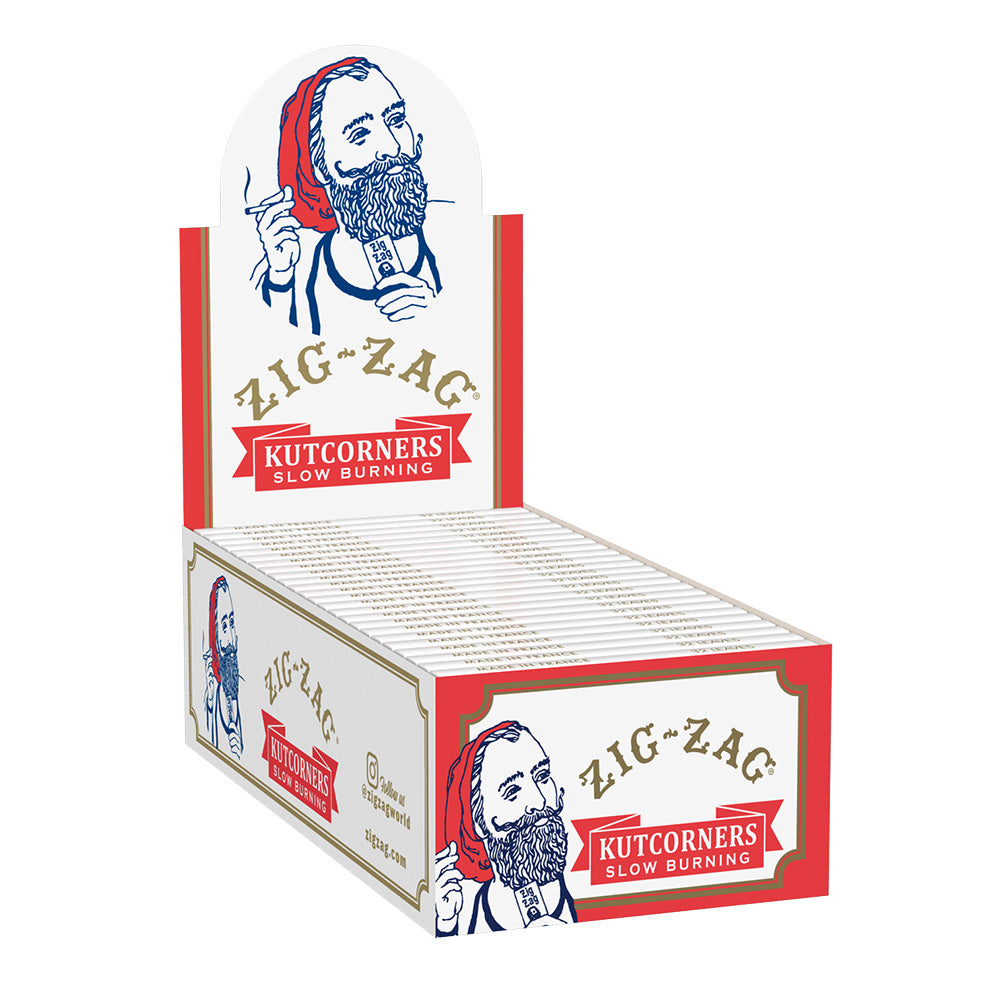 Front view of the Zig Zag Cut Corner Rolling Papers package, displaying a vintage illustration against a red and white background. Front view of the Zig Zag Cut Corner Rolling Papers package, displaying a vintage illustration against a red and white background.