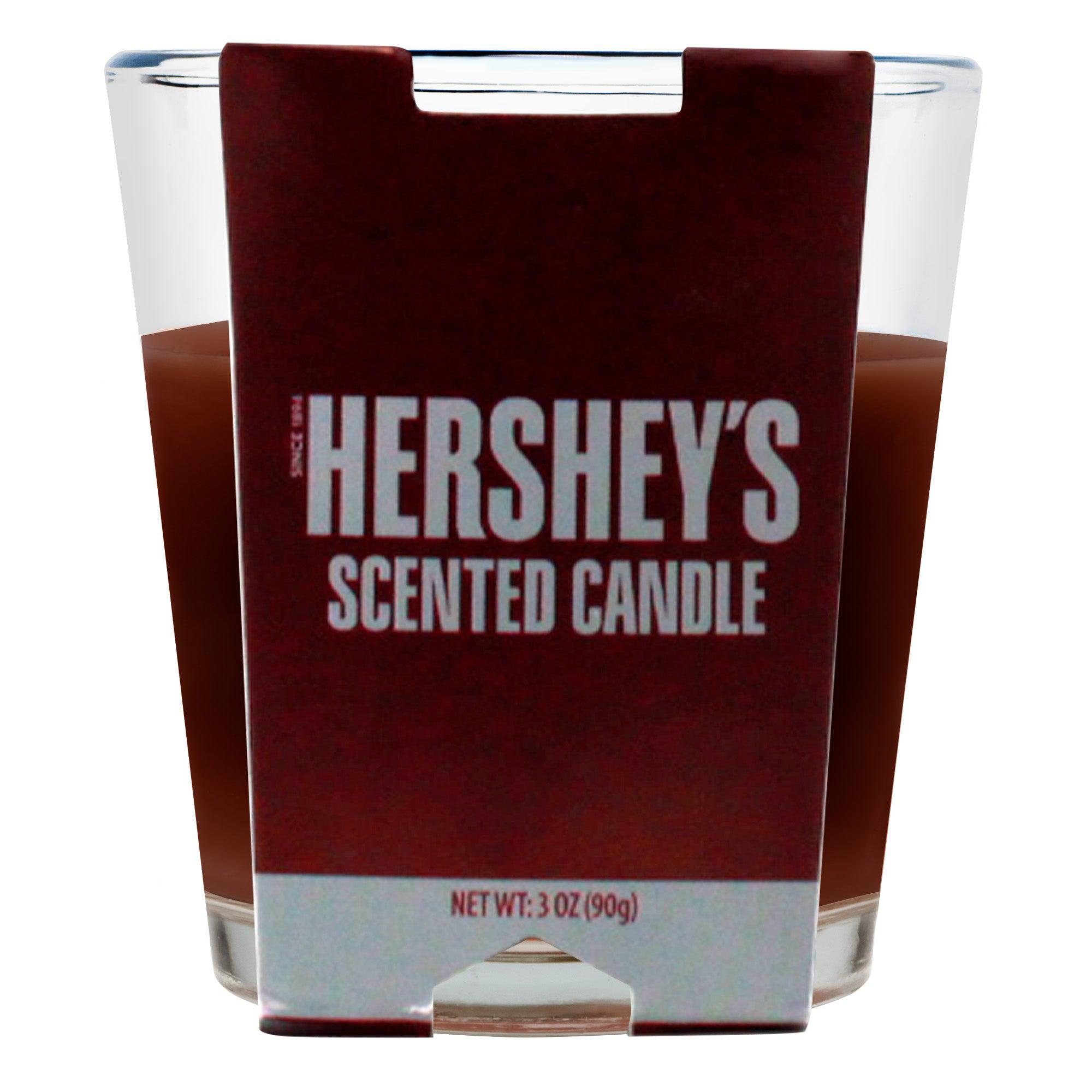 Front view of the 3oz Candy Scented Candle in a clear glass container with a dark, wax-like filling. Front view of the 3oz Candy Scented Candle in a clear glass container with a dark, wax-like filling.