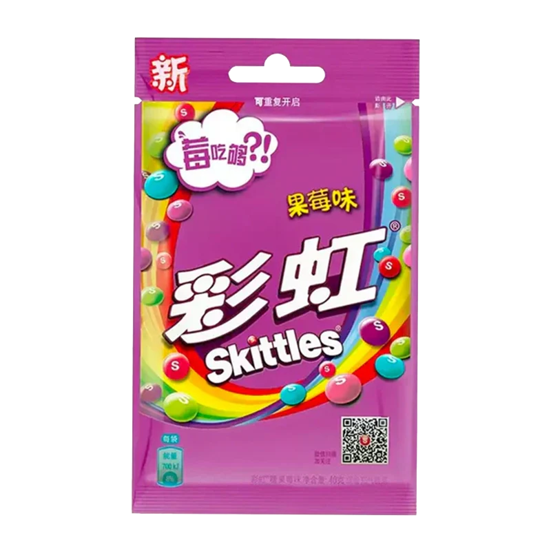 A close-up of Skittles - Wild Berry Candy packaging with colorful Chinese characters and graphics. A close-up of Skittles - Wild Berry Candy packaging with colorful Chinese characters and graphics.