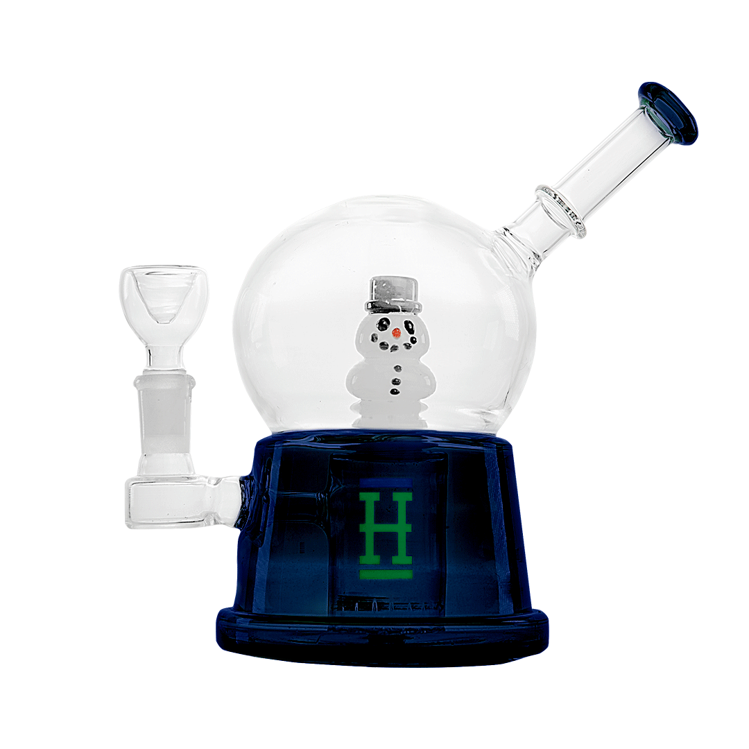 Front view of the Snow Globe XL Bong, featuring a clear glass sphere atop a dark base. Front view of the Snow Globe XL Bong, featuring a clear glass sphere atop a dark base.