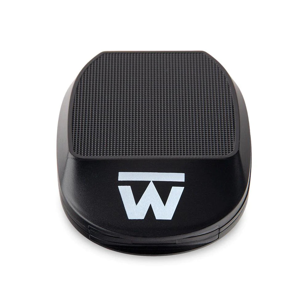 A close-up, top-down view of the Sonic Scale, showcasing its smooth, dark surface and minimalist design. A close-up, top-down view of the Sonic Scale, showcasing its smooth, dark surface and minimalist design.