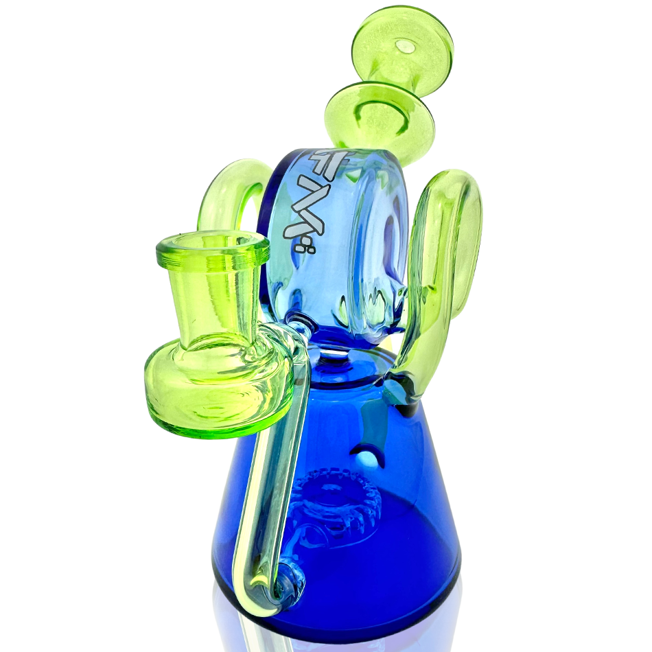 Front view of the Double Ram Recycler Rig, showcasing its blue glass construction and multiple stacked bubbles. Front view of the Double Ram Recycler Rig, showcasing its blue glass construction and multiple stacked bubbles.