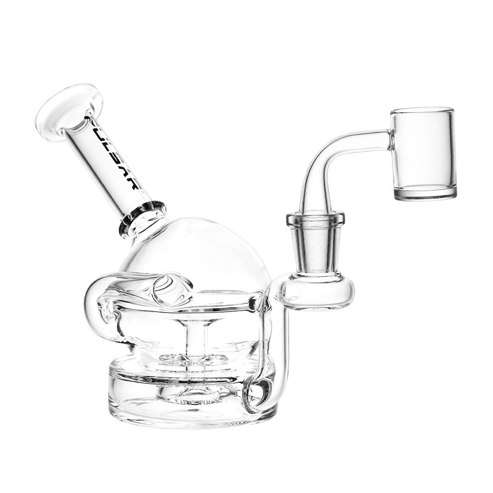 A three-quarter view of the Clear Ball Recycler Dab Rig, showcasing its clear glass construction and rounded, spherical design. A three-quarter view of the Clear Ball Recycler Dab Rig, showcasing its clear glass construction and rounded, spherical design.