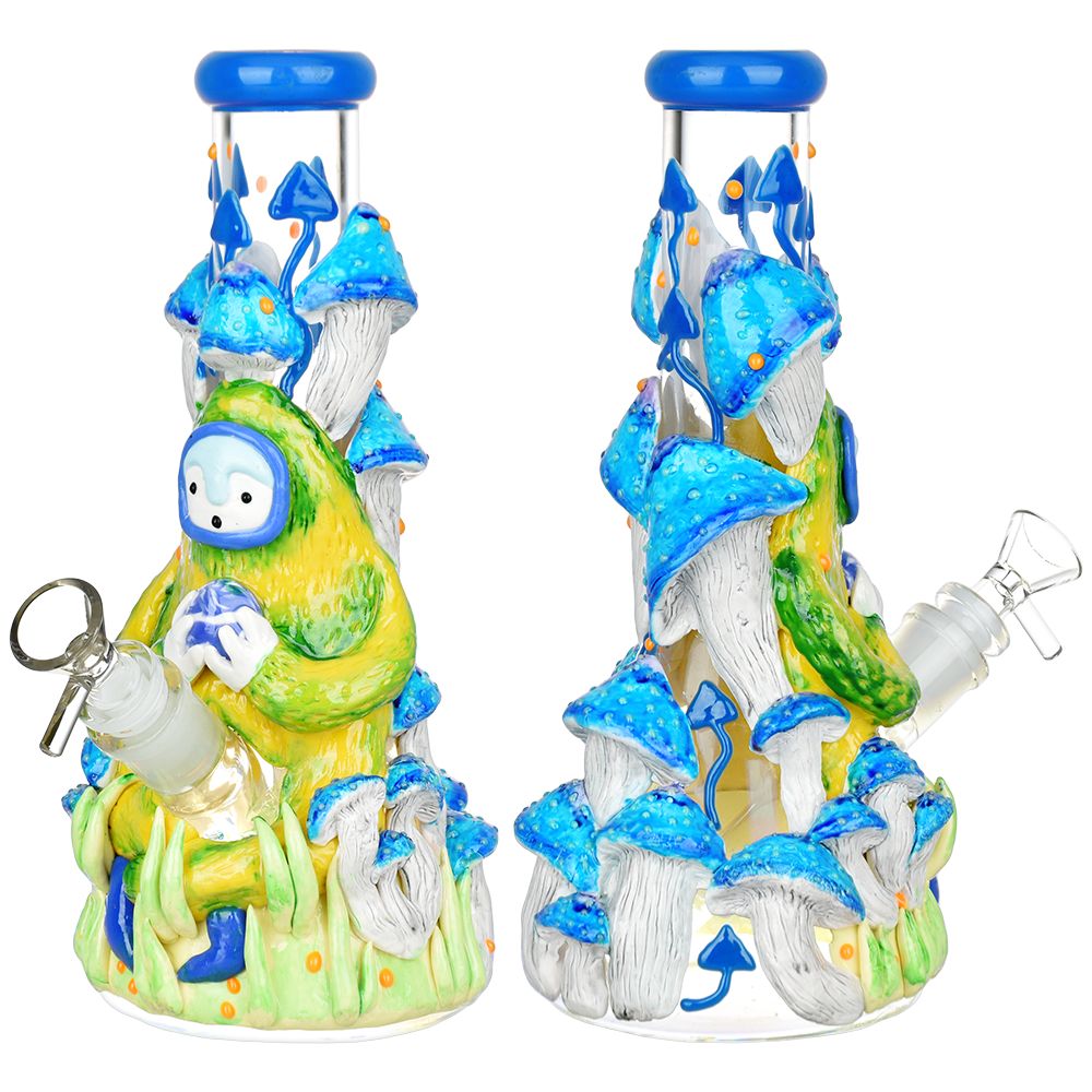 Front view of the Artist Series Glow Beaker Water Pipe, a colorful glass piece with sculpted mushroom details. Front view of the Artist Series Glow Beaker Water Pipe, a colorful glass piece with sculpted mushroom details.