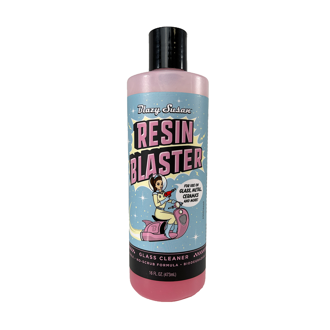 Front view of the Resin Blaster Glass Cleaner bottle with a colorful vintage label and bold text against a plain white background. Front view of the Resin Blaster Glass Cleaner bottle with a colorful vintage label and bold text against a plain white background.