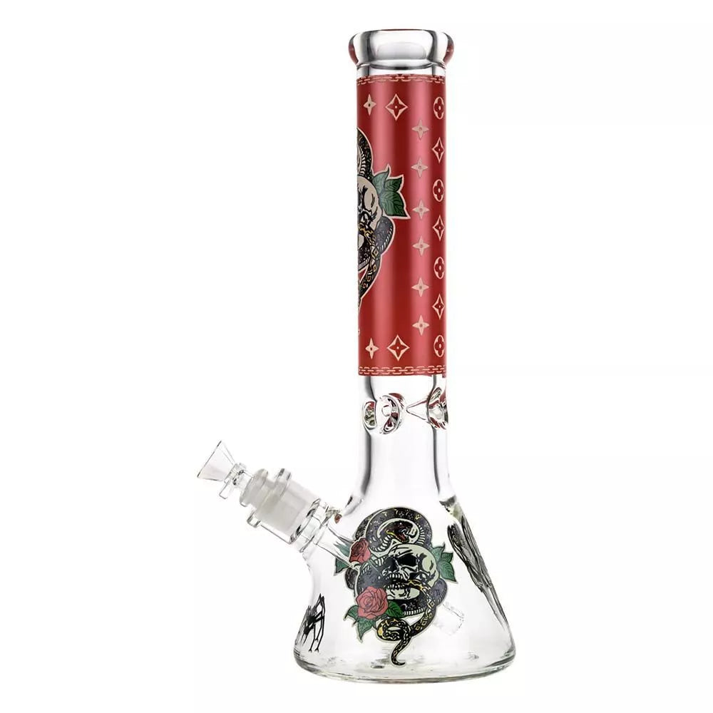 Front view of the Red Beaker Ice Bong with Glow in the Dark Snake and Skull Print, showcasing its detailed, patterned design against a plain white background. Front view of the Red Beaker Ice Bong with Glow in the Dark Snake and Skull Print, showcasing its detailed, patterned design against a plain white background.