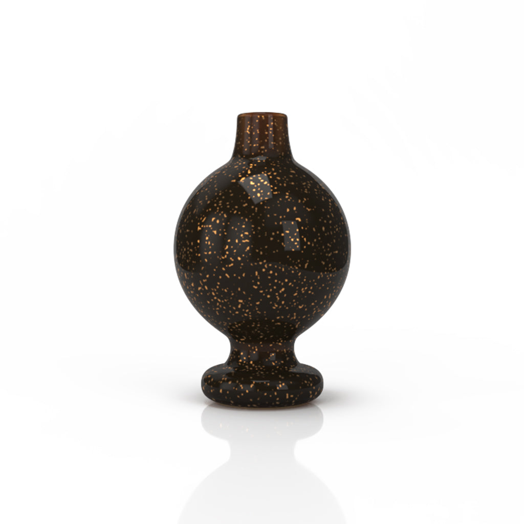 Front view of the Galaxy Bubble Carb Cap, a dark glass cap reflecting light on a clean white surface. Front view of the Galaxy Bubble Carb Cap, a dark glass cap reflecting light on a clean white surface.