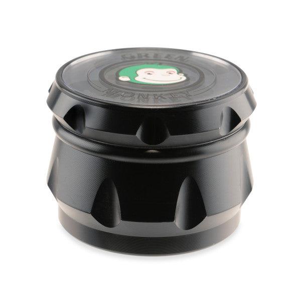 A close-up, angled view of the Baboon Crown 63mm Grinder, showcasing its metallic, multi-tiered design. A close-up, angled view of the Baboon Crown 63mm Grinder, showcasing its metallic, multi-tiered design.