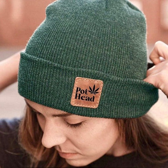 A close-up, front view of the Pot Head Beanie worn by a person, with soft lighting and a blurred background. A close-up, front view of the Pot Head Beanie worn by a person, with soft lighting and a blurred background.