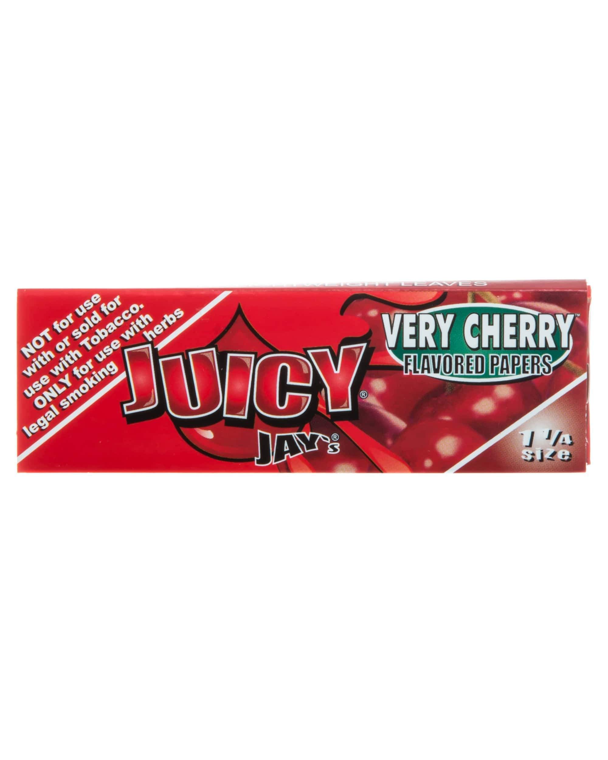 A close-up of Very Cherry 1-1/4 Rolling Papers packaging with bold red lettering and branding details against a plain background. A close-up of Very Cherry 1-1/4 Rolling Papers packaging with bold red lettering and branding details against a plain background.