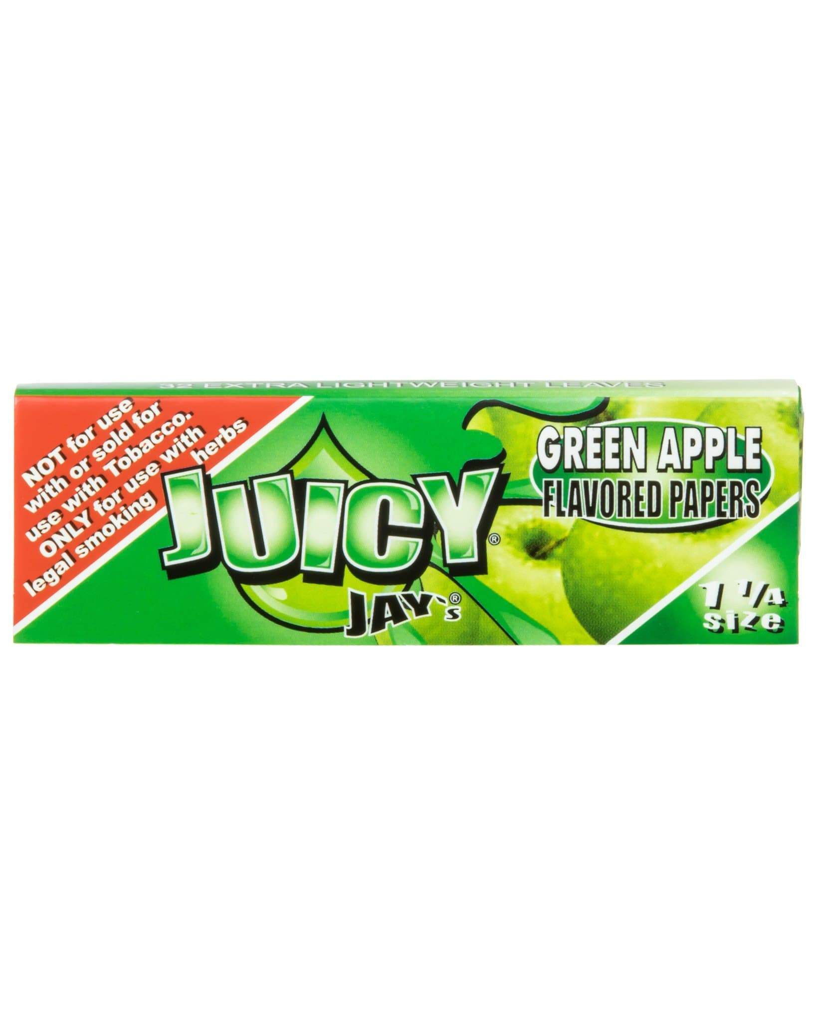 A close-up of Green Apple 1-1/4 Rolling Papers, displaying a bright green packet with bold white lettering against a dark background. A close-up of Green Apple 1-1/4 Rolling Papers, displaying a bright green packet with bold white lettering against a dark background.