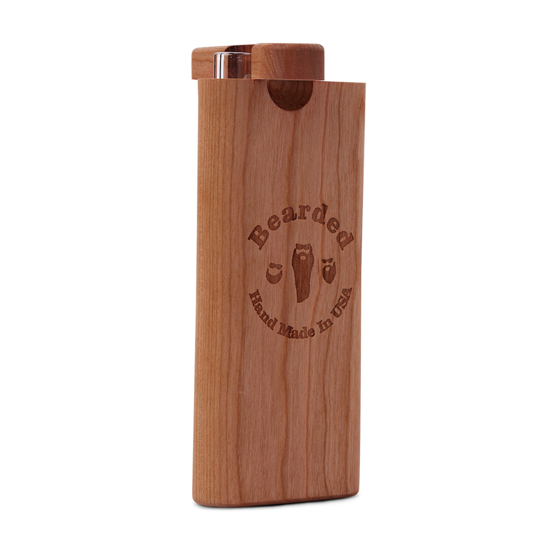 Front view of the Chillum Dugout, a wooden one-piece with a sleek, rectangular design and subtle wood grain texture. Front view of the Chillum Dugout, a wooden one-piece with a sleek, rectangular design and subtle wood grain texture.
