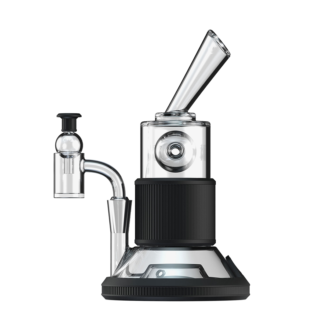 A three-quarter view of the Tandem Rig Kit, featuring a black base and clear glass components, set against a plain white background. A three-quarter view of the Tandem Rig Kit, featuring a black base and clear glass components, set against a plain white background.