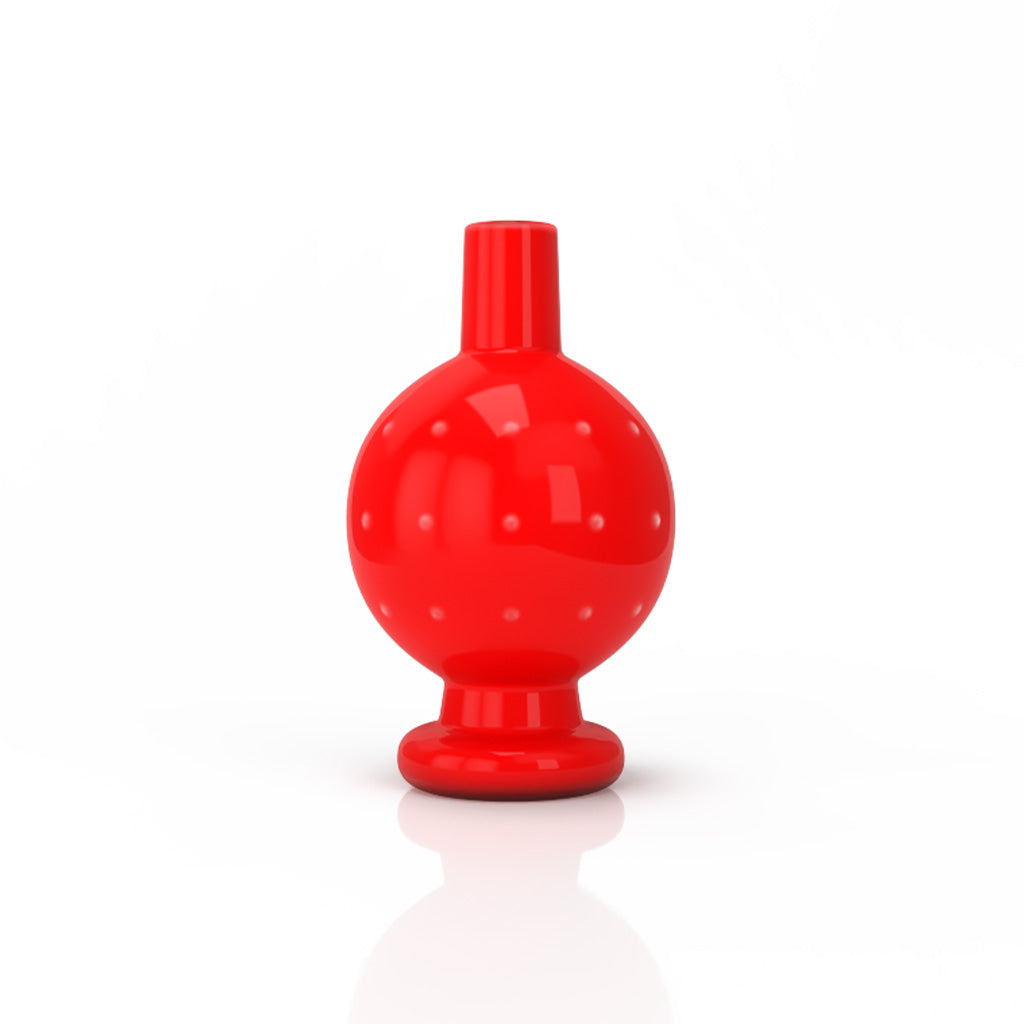 A studio shot of the Neon Bubble Carb Cap, showcasing its smooth, rounded shape and reflective surface on a white background. A studio shot of the Neon Bubble Carb Cap, showcasing its smooth, rounded shape and reflective surface on a white background.