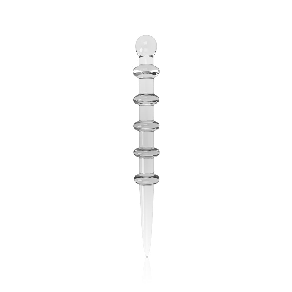 Close-up of the Stardust Wand Dabber with a slender, clear glass tip and silver accents against a white backdrop. Close-up of the Stardust Wand Dabber with a slender, clear glass tip and silver accents against a white backdrop.