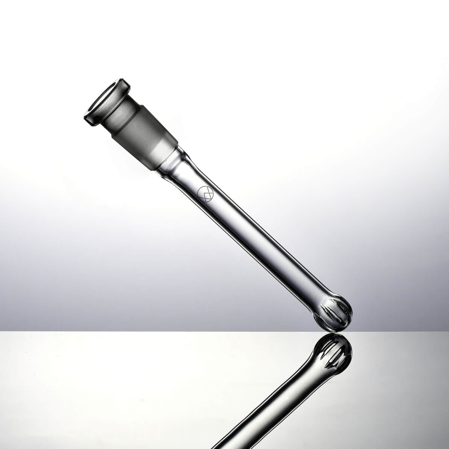 A close-up view of the Slitted Downstem, showing the slitted tip in clear glass against a simple white background. A close-up view of the Slitted Downstem, showing the slitted tip in clear glass against a simple white background.