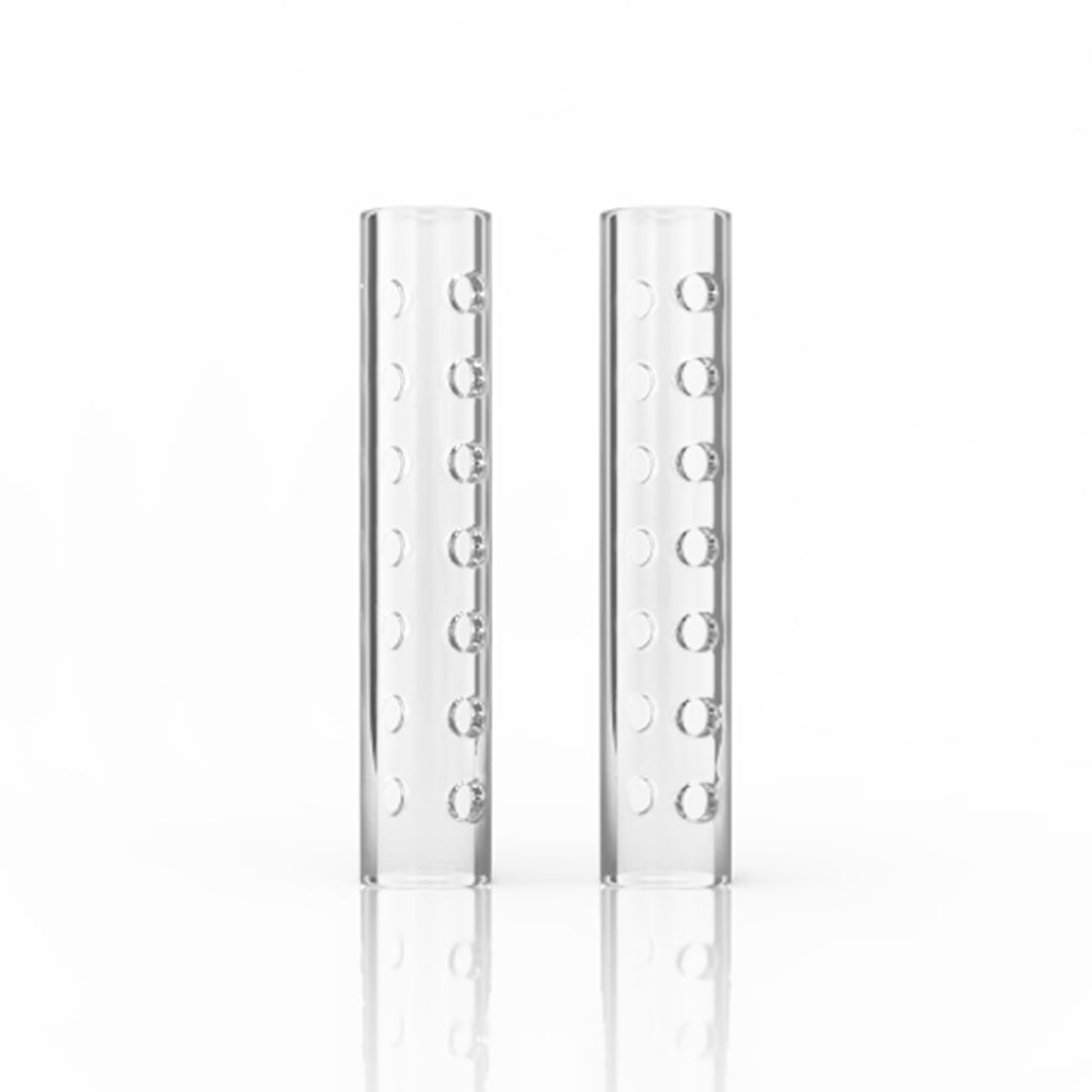 A studio shot of the Hollow Quartz Pillars with Holes, displaying the clear, cylindrical quartz pillars with visible holes throughout. A studio shot of the Hollow Quartz Pillars with Holes, displaying the clear, cylindrical quartz pillars with visible holes throughout.