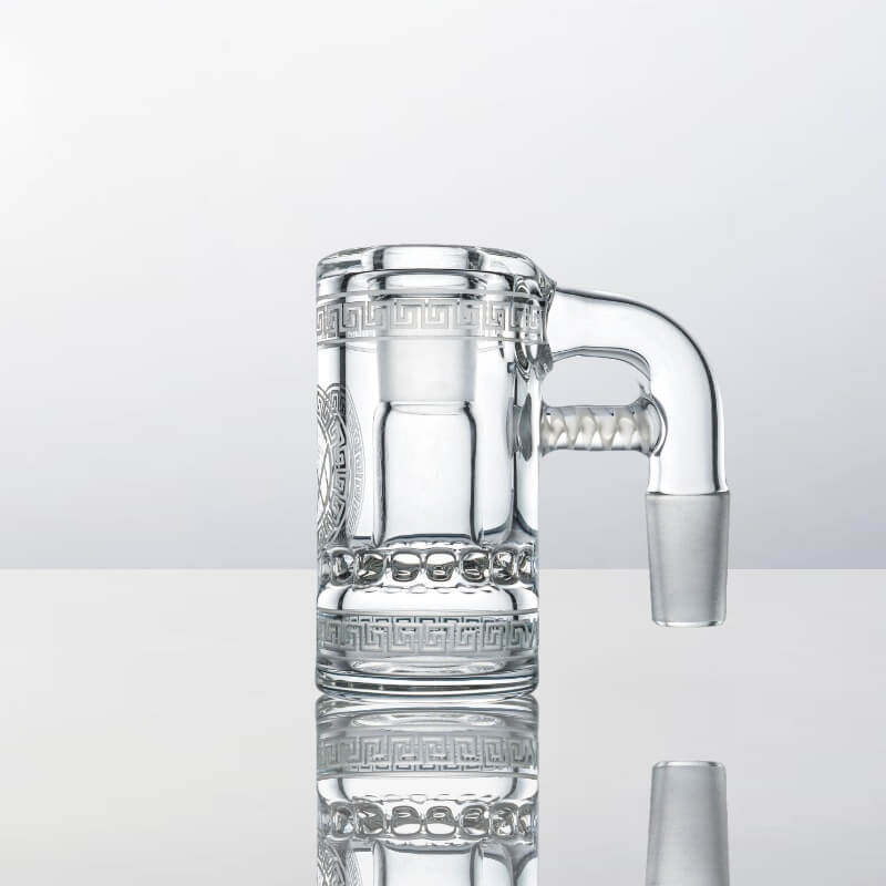 A studio shot of the Athos Ashcatcher, displaying its clear glass construction and angled design against a neutral backdrop. A studio shot of the Athos Ashcatcher, displaying its clear glass construction and angled design against a neutral backdrop.
