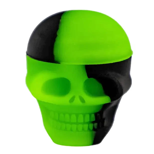 Front view of the Silicone Skull Container, a small, black skull-shaped container isolated on a white background. Front view of the Silicone Skull Container, a small, black skull-shaped container isolated on a white background.