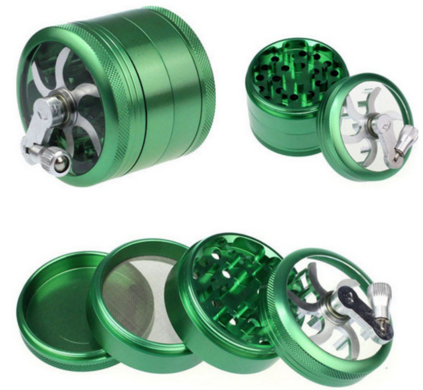 A disassembled view of the Hand Crank 4-Piece Grinder, showcasing its four metallic sections arranged in a row. A disassembled view of the Hand Crank 4-Piece Grinder, showcasing its four metallic sections arranged in a row.