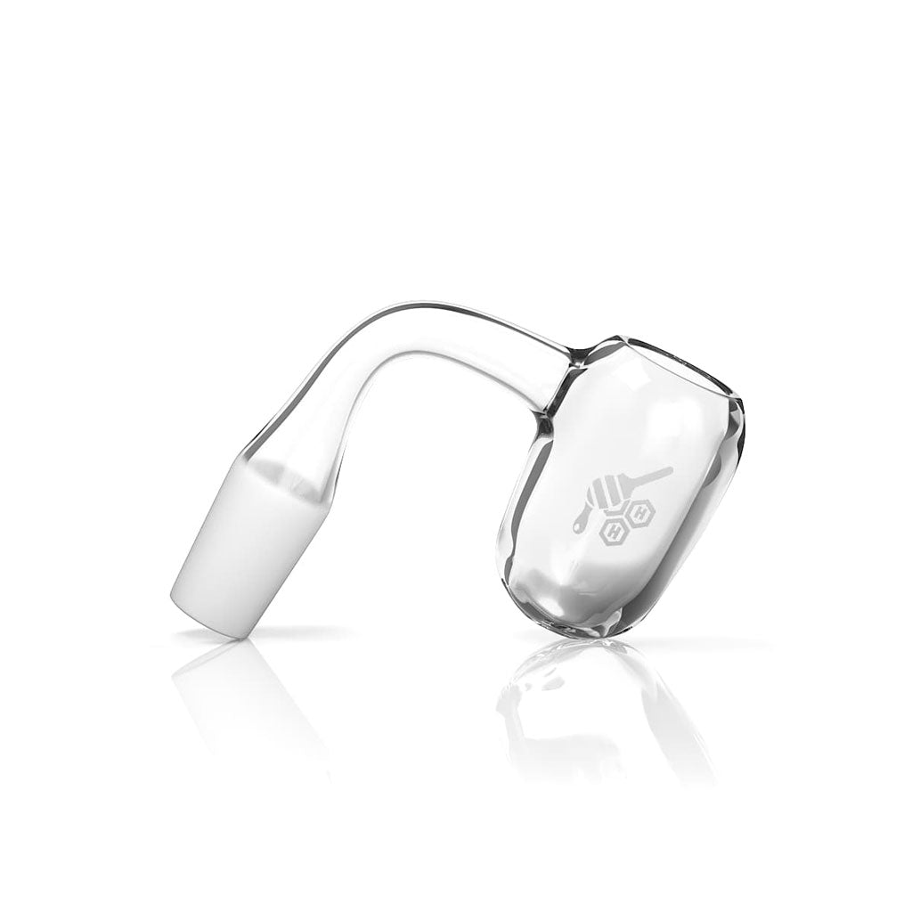 A close-up, angled view of the Honey Barrel Quartz Banger 90° Yellow Line, showcasing its reflective surface and rounded shape. A close-up, angled view of the Honey Barrel Quartz Banger 90° Yellow Line, showcasing its reflective surface and rounded shape.