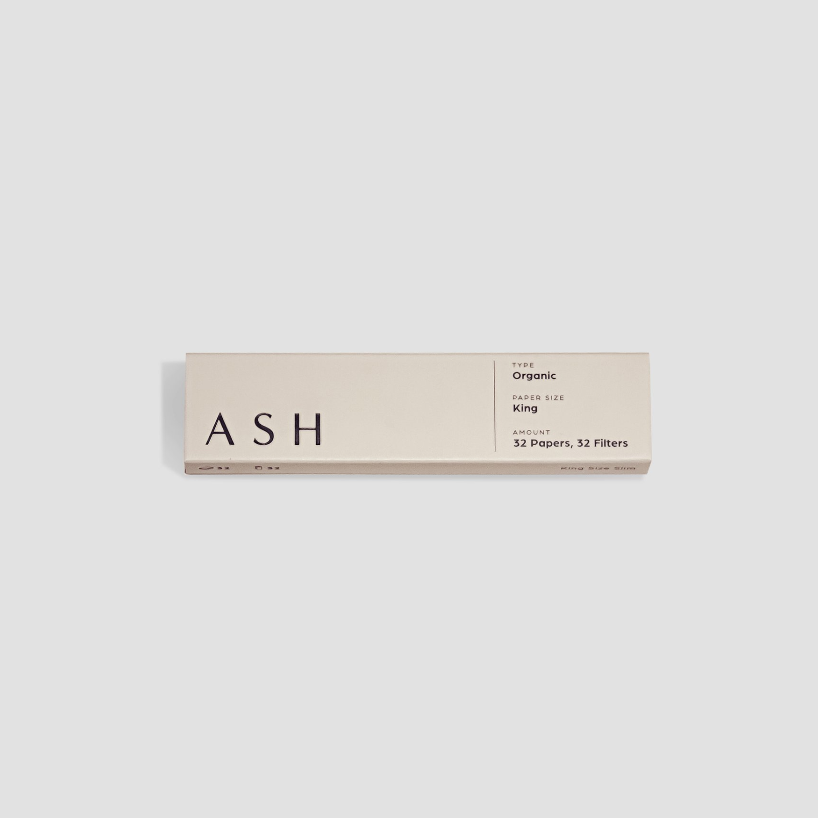 Close-up of Organic King Size Rolling Papers with a simple, branded design on a plain background. Close-up of Organic King Size Rolling Papers with a simple, branded design on a plain background.