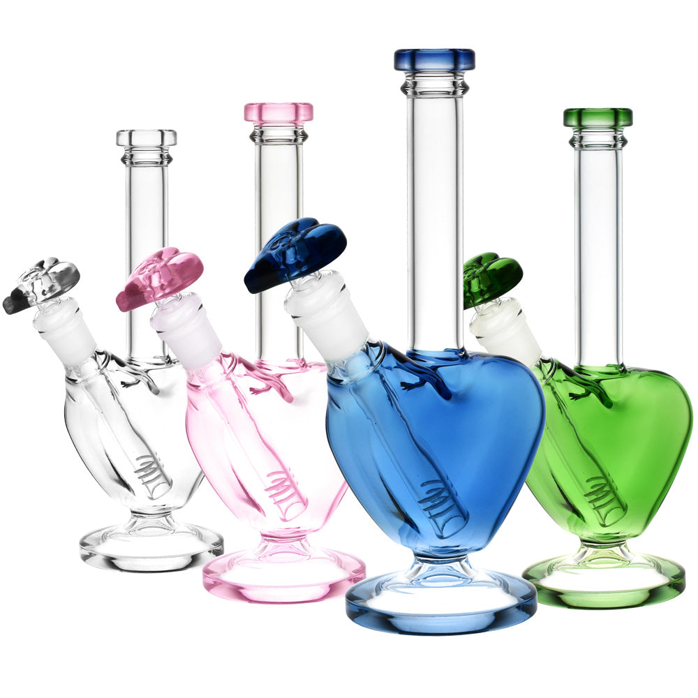 A studio shot displays the Love Water Pipe in varying shades of blue, pink, and green, arranged at a slight angle against a plain white background. A studio shot displays the Love Water Pipe in varying shades of blue, pink, and green, arranged at a slight angle against a plain white background.